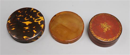 Three circular boxes - two wood and one tortoiseshell